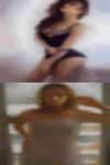 Naked woman holding show baton